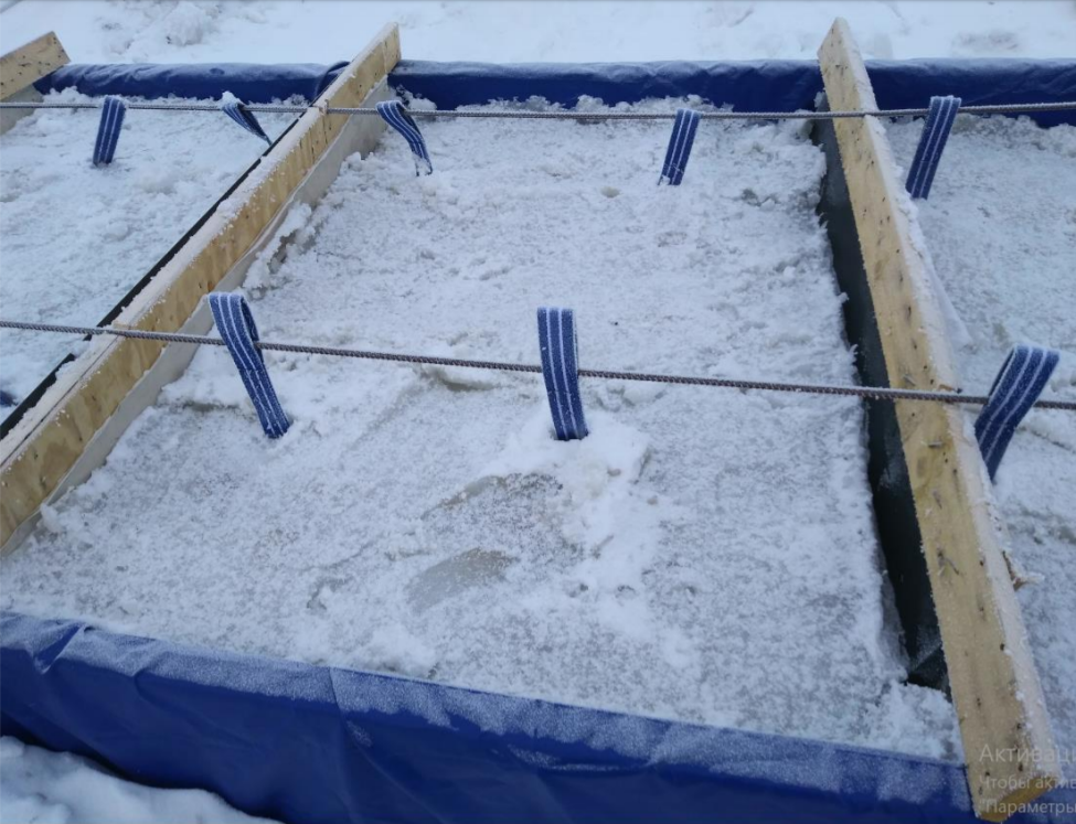 Frozen snow mass in ice blocks
